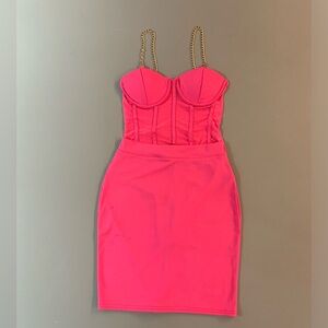 Bright pink 2 piece outfit dress - bodysuit and skirt with gold chain straps.